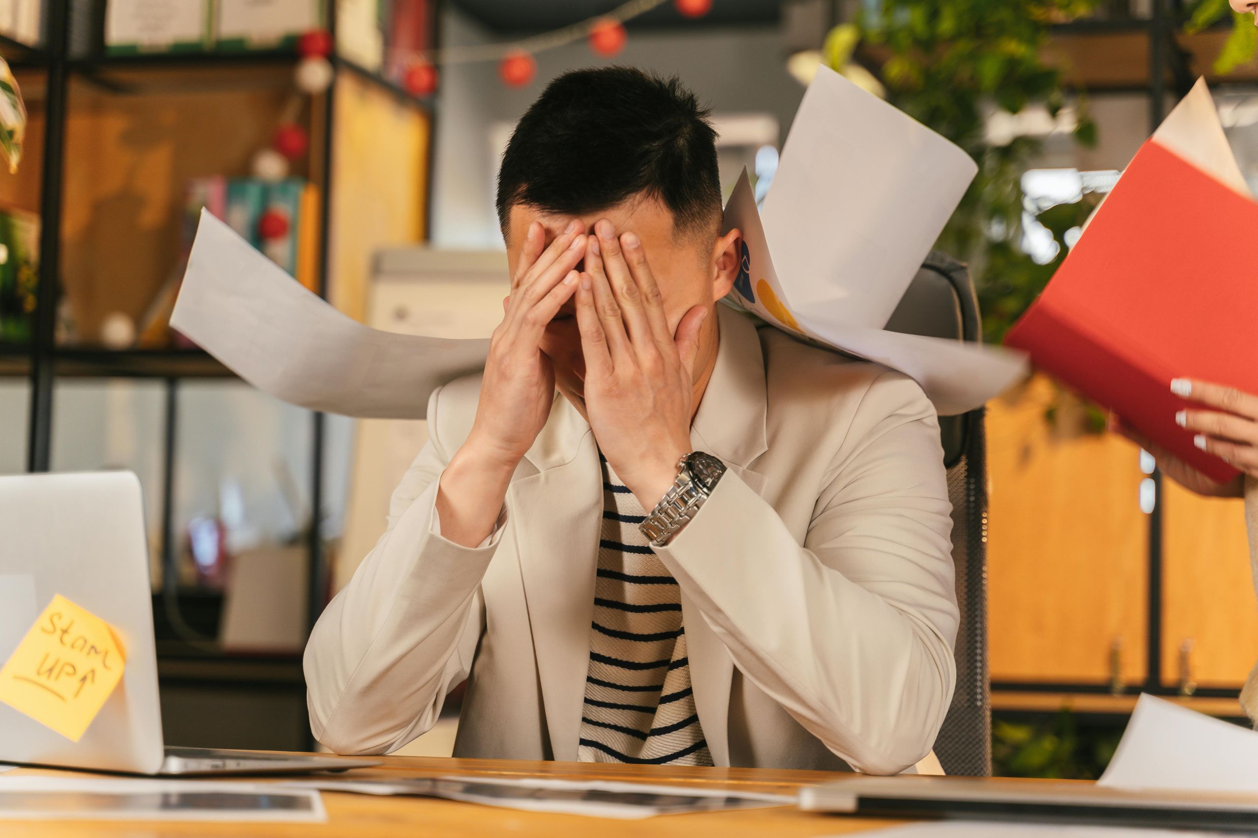 Professional under workplace pressure